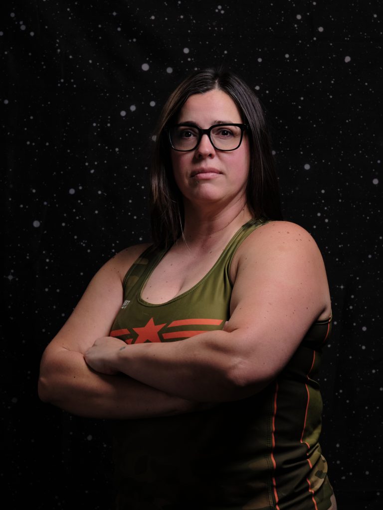 Salty is glaring at the screen with her arms crossed